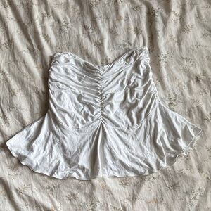 White ruched mini skirt with built in shorts size small in great condition